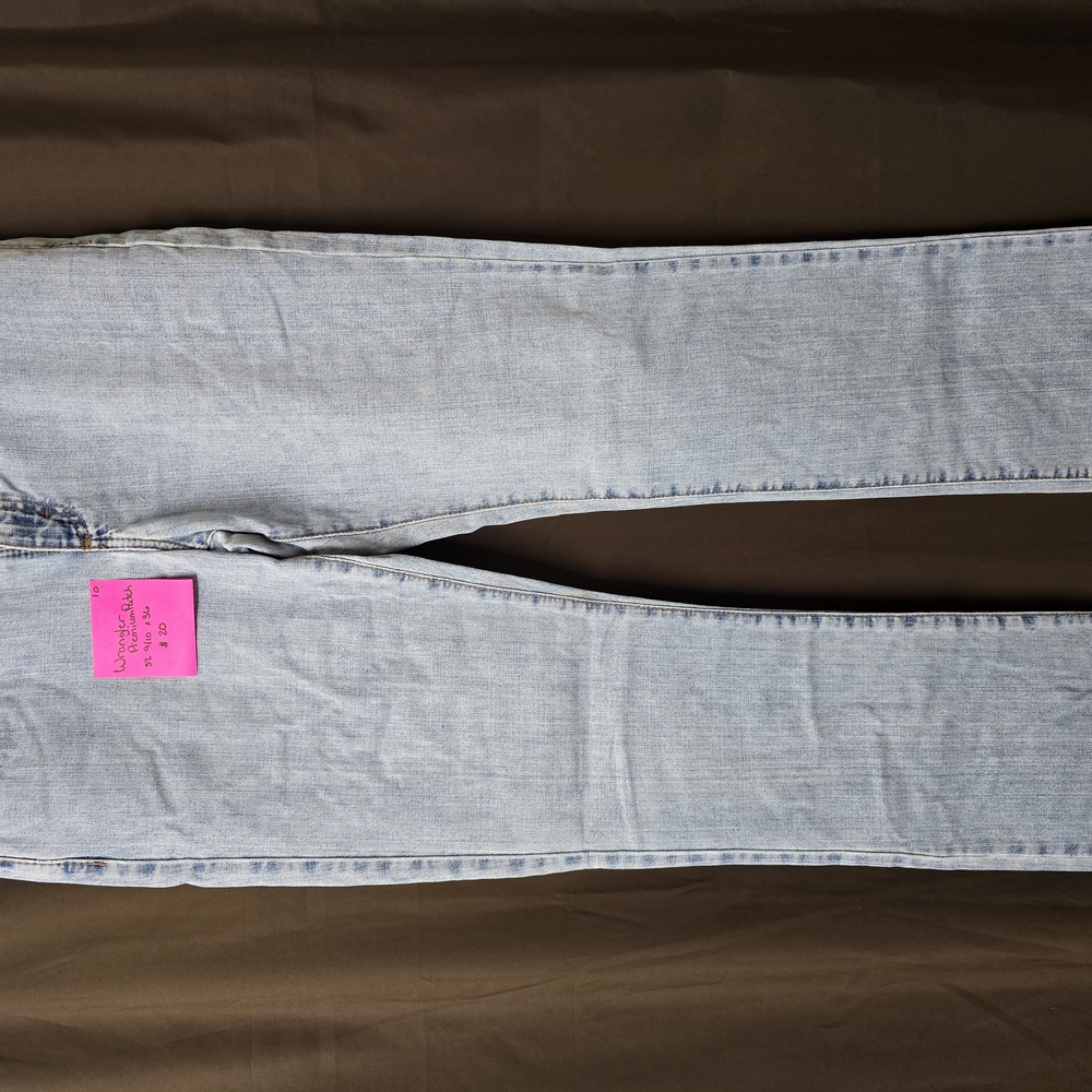 Blue Boot Cut Jeans with Vintage Distressing